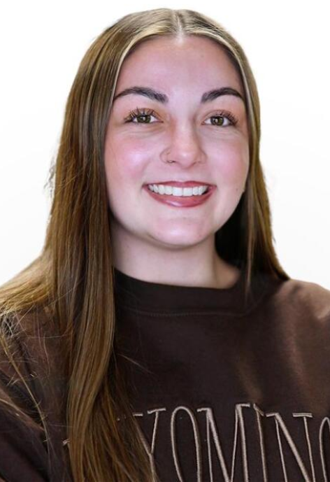 Cowboy Coach Brinley Nelson poses for a photo