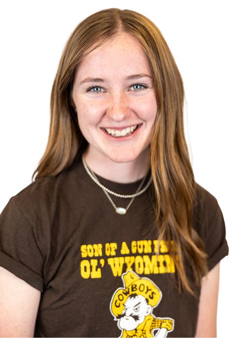 Cowboy Coach Cady McVaugh poses for a photo