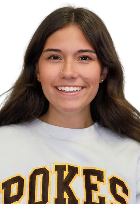 Cowboy Coach Cassy Perez poses for a photo