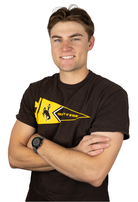 Cowboy Coach Cooper Kane poses for a photo