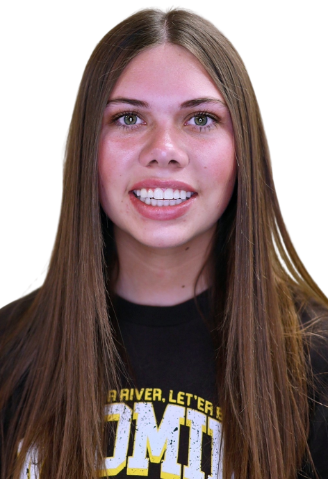 Cowboy Coach Emily Litzinger poses for a photo