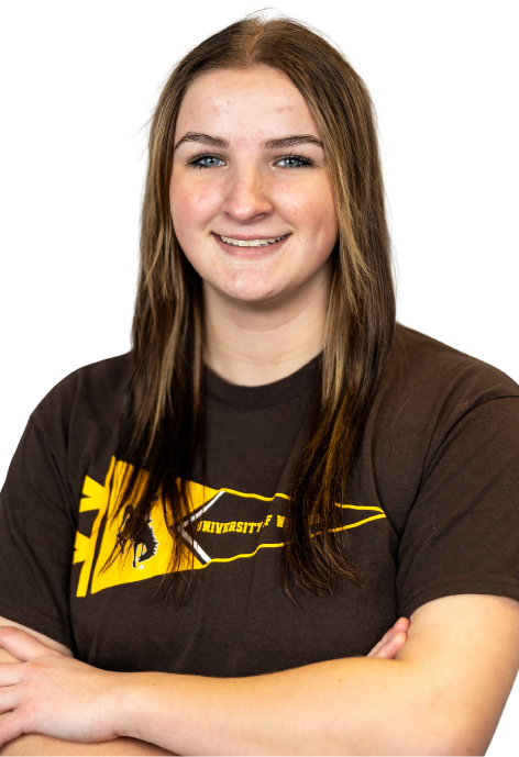 Cowboy Coach Izzy Sullivan poses for a photo