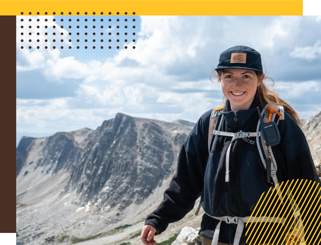 A UW student smiles as she hikes at the Snowy Range mountains