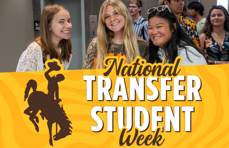 Students posing for a photo with a "National Transfer Week" graphic