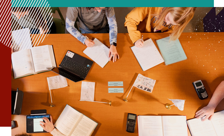 Photo from above a table with students working on projexts