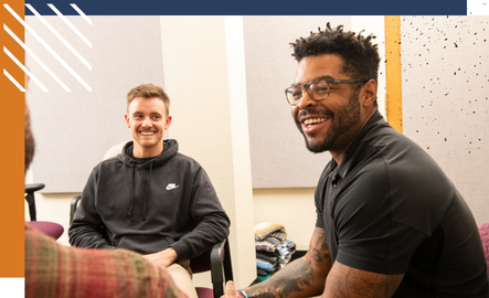 UW students and counselors from the University Counseling Center have a discussion during a group session.