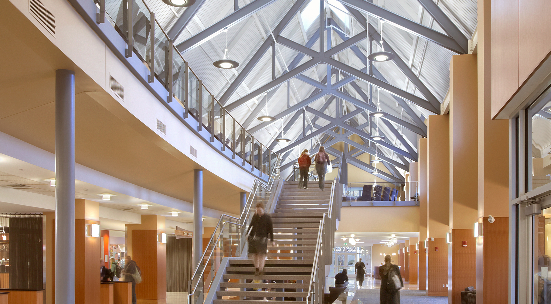 interior of building people walk up stair set