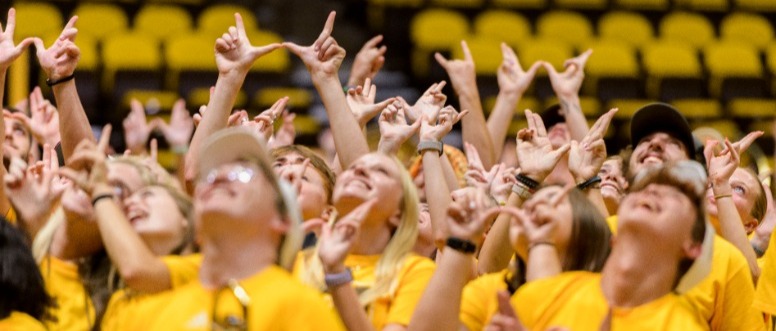 Students in yellow shirts