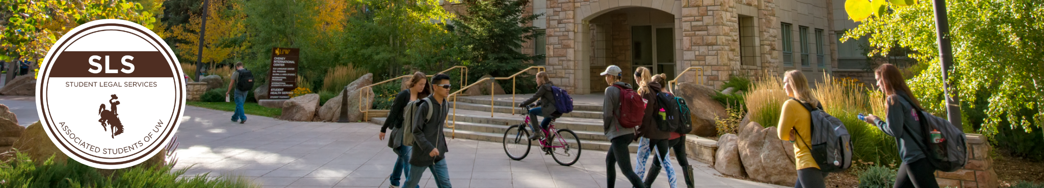 Students walking in front of UW building with SLS logo
