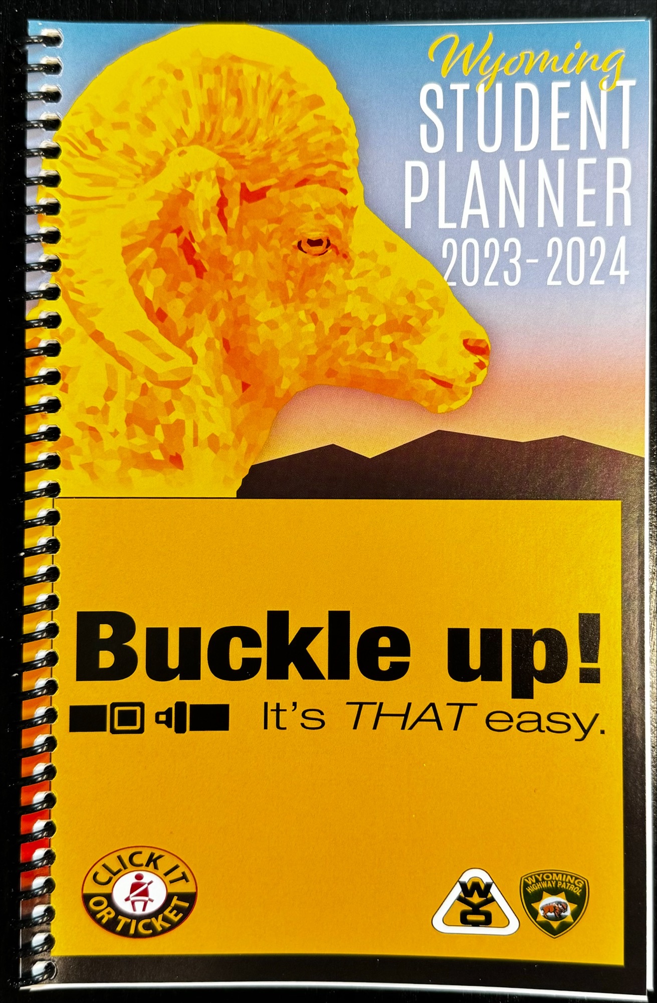 "Buckle U" WYDOT front cover of student planner