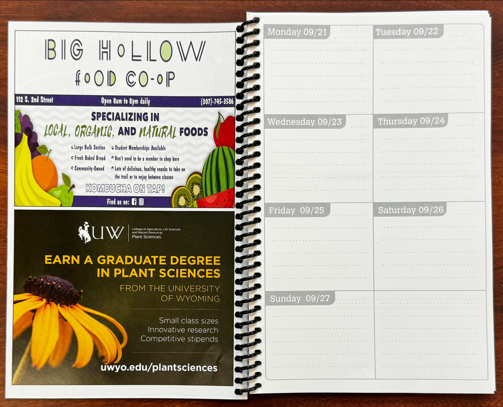 2 half page advertisements next to a calendar page