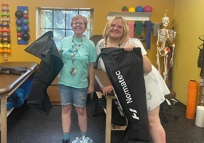 Two Summer Bridge students on a tour of the Wellness Center