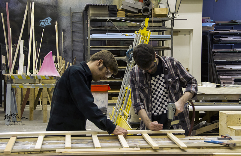 photo of students building a platform