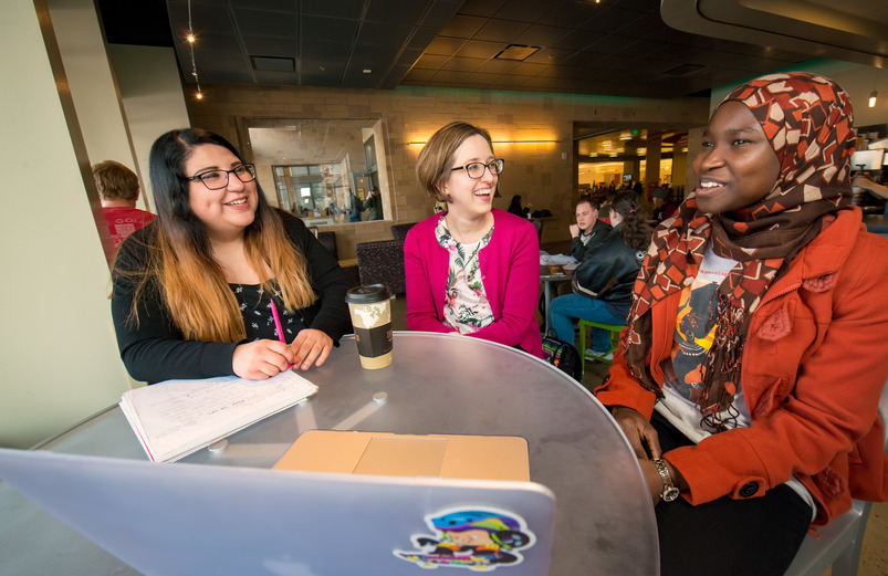 students gathered at a table