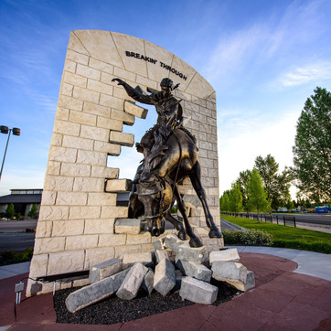 breaking through statue