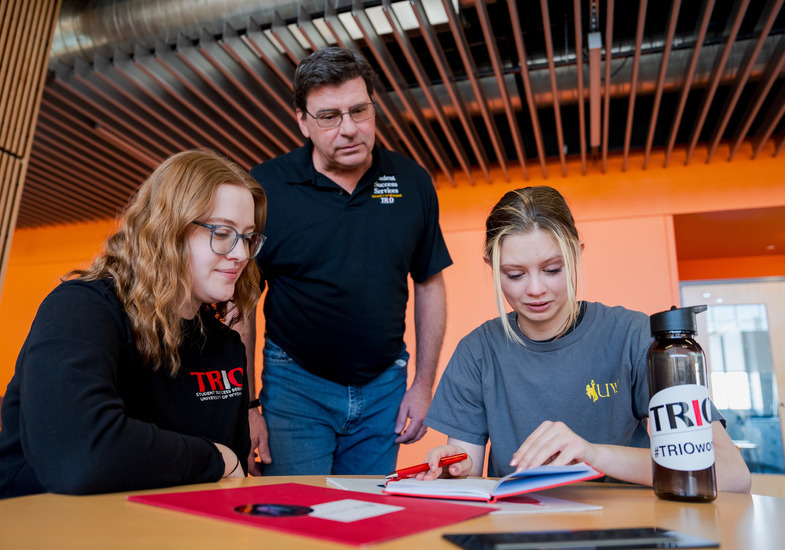 Members of the UW Student Success Team work with a student transferring to UW.