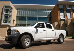 A UW truck is parked on the University of Wyoming campus
