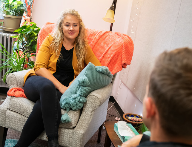 Woman talking on chair
