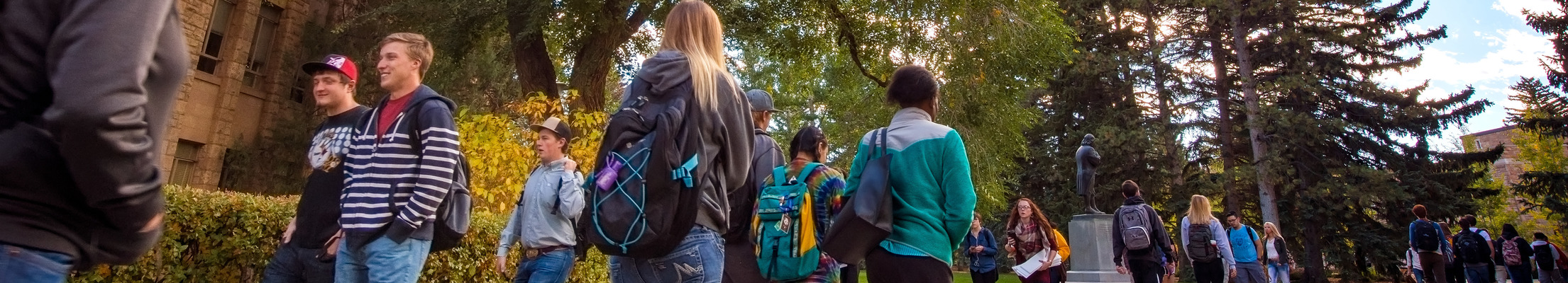 students walking across campus