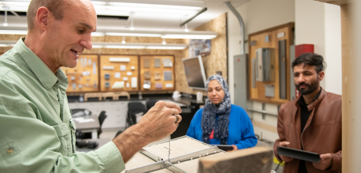 a faculty member doing a demonstration for some students