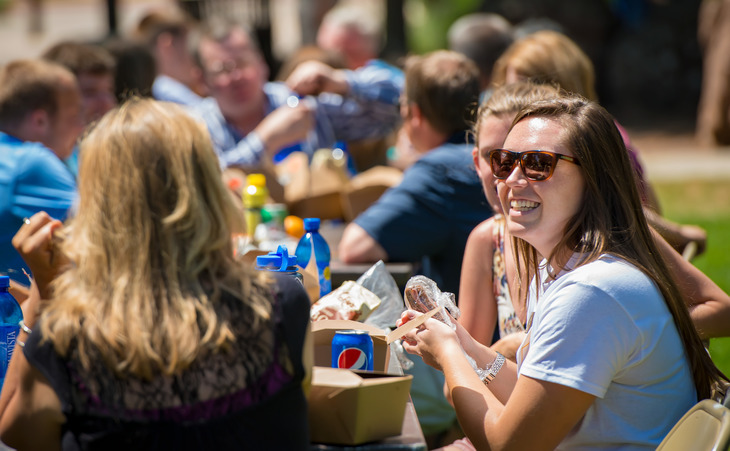 Students enjoy a sunny day on Prexy's Pasture