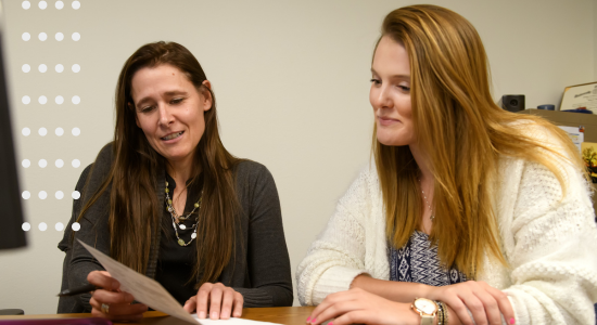 Student working with a staff memeber