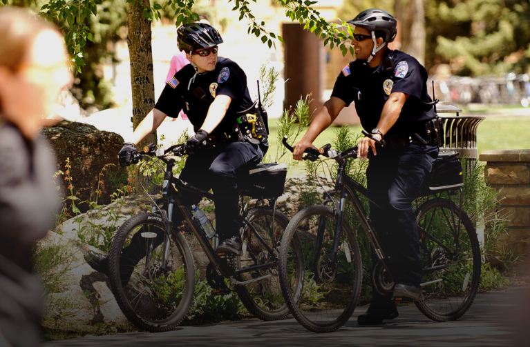 Two UW Police on bicycles