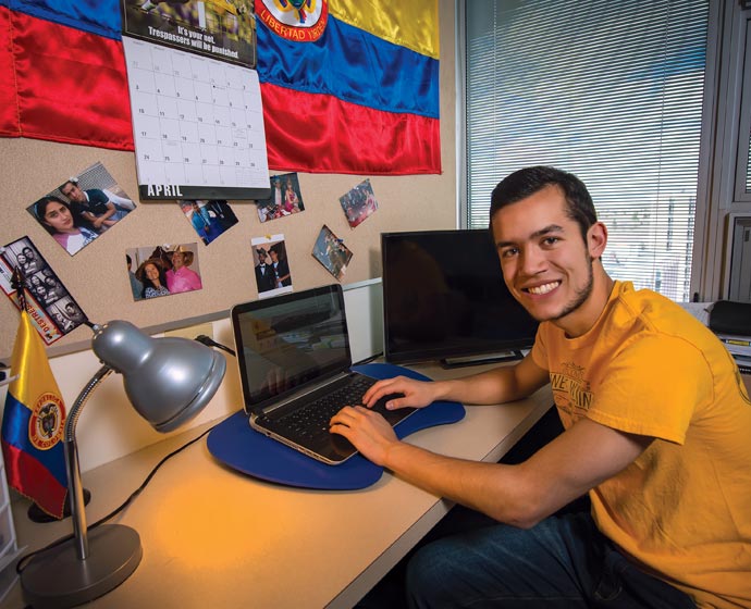 student in dorm room