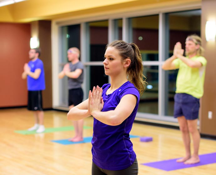 half acre campus recreation people doing yoga