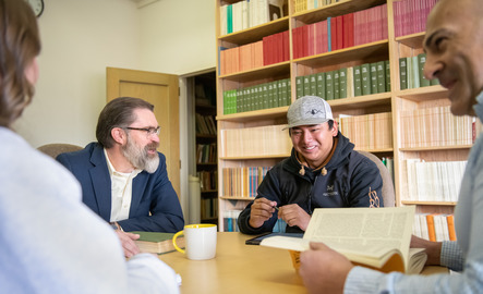 Students and faculty talking