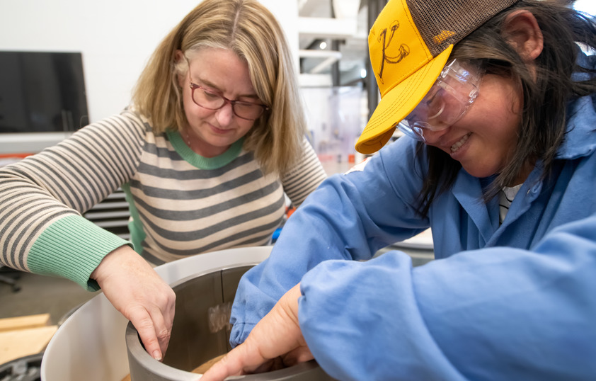 Student and professor working in lab