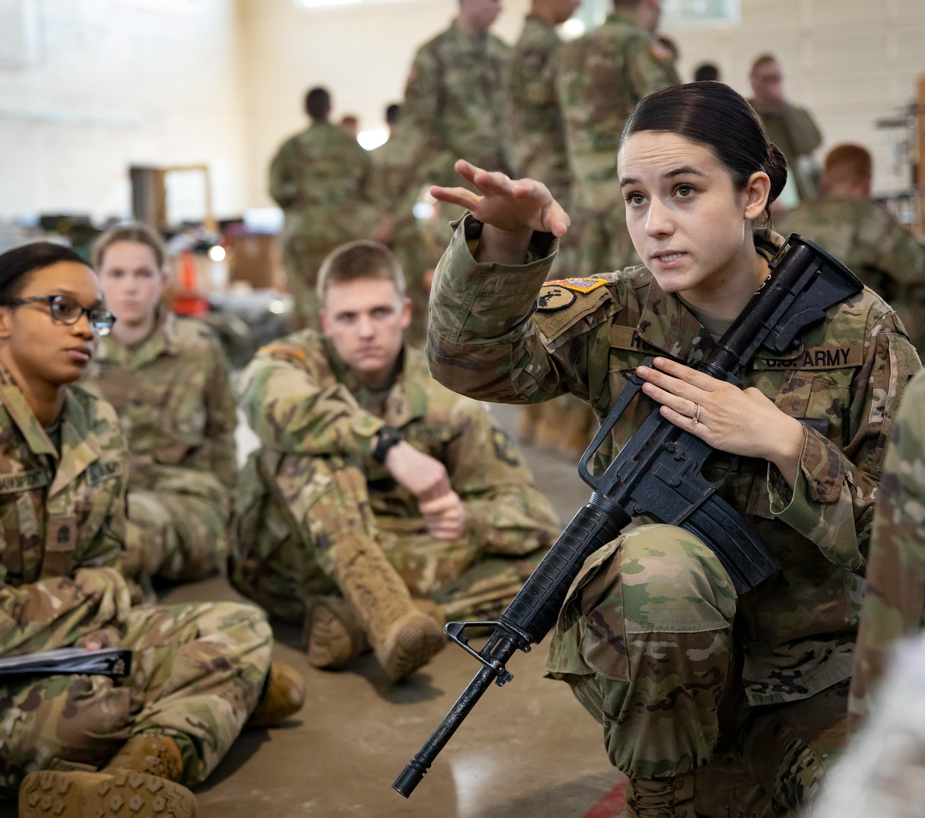 Student guiding other students through training