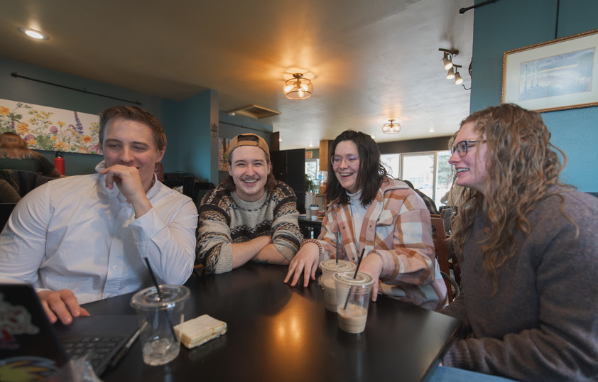 Students sitting together at coffee shop