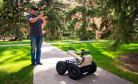 Student controls a robot with virtual reality goggles