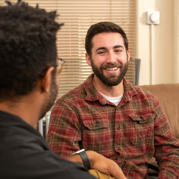 Two people smiling