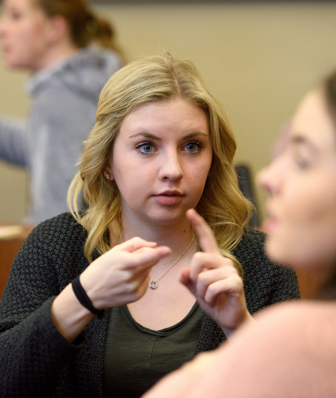 Student signing in class