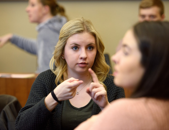 Student signing in class