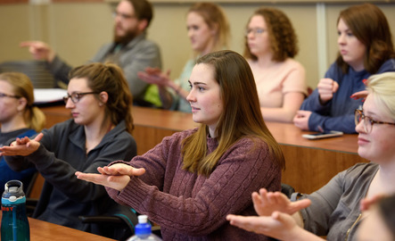 Students signing in class