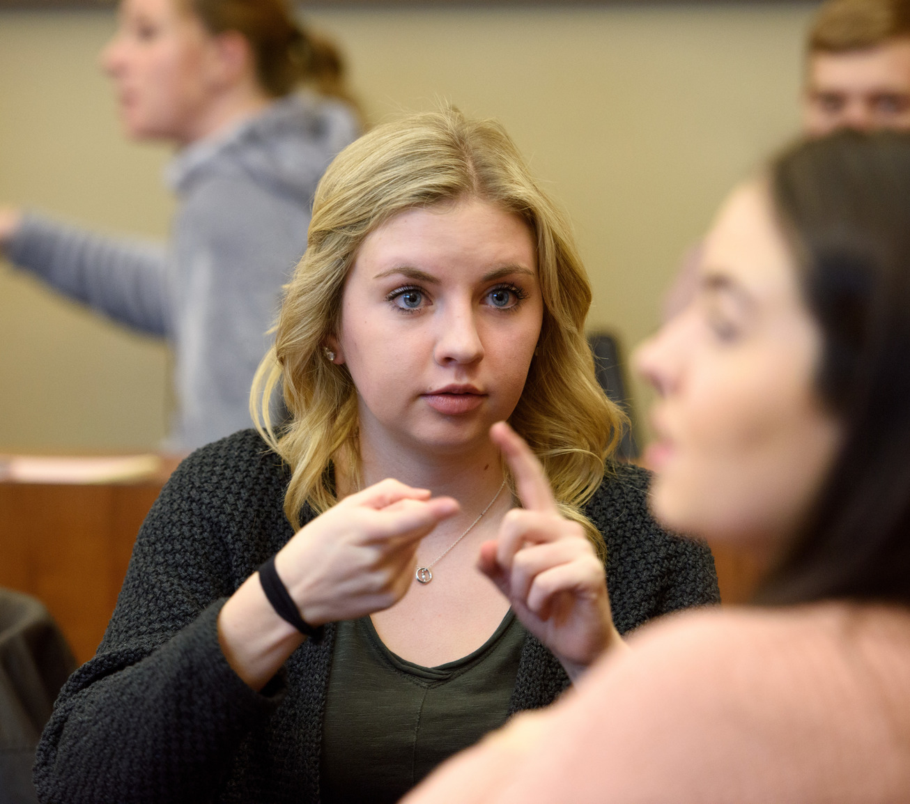 Student signing in class