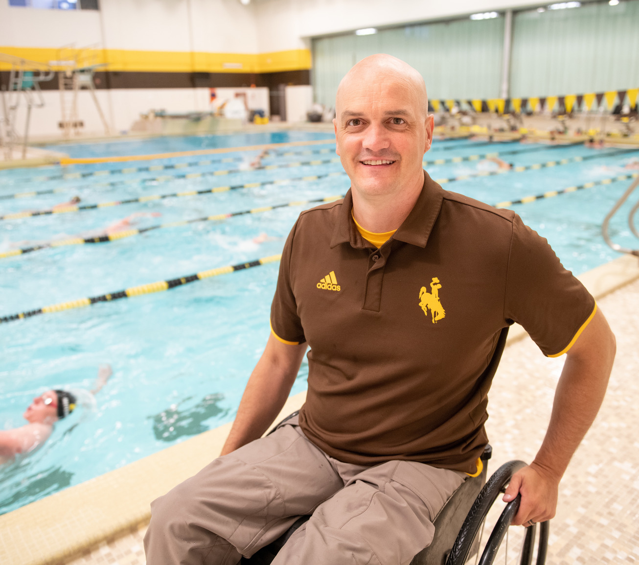 A coach smiling