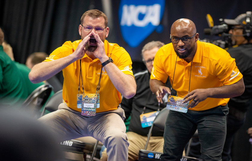 two coaches teaching