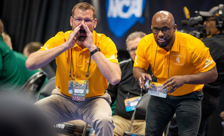 Coaches at a wrestling match