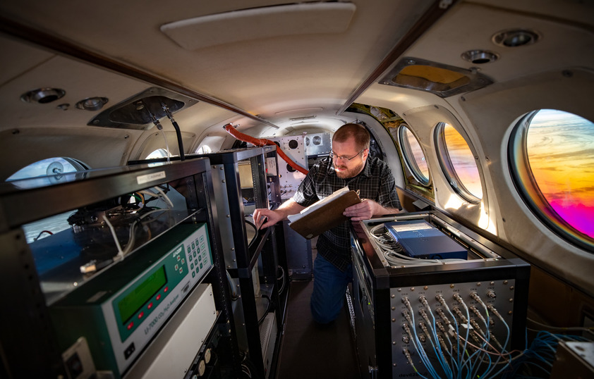 Researcher in airplane