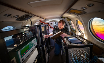 Researcher in airplane