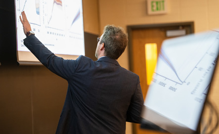Professor teaching at board