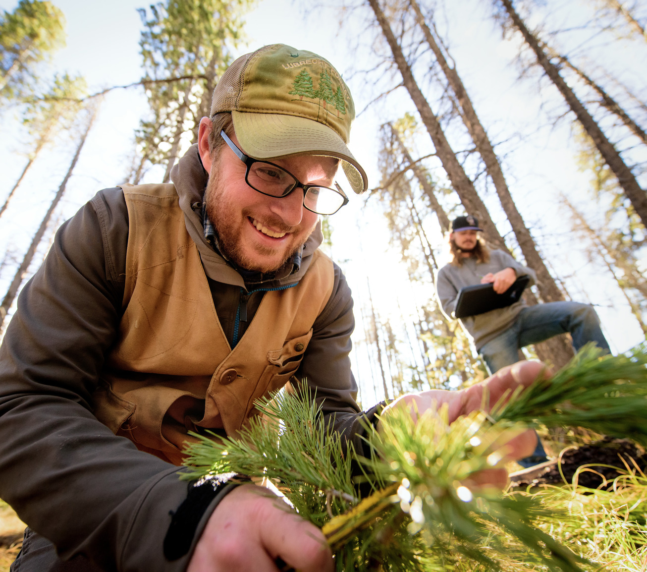 Two researchers out in the field