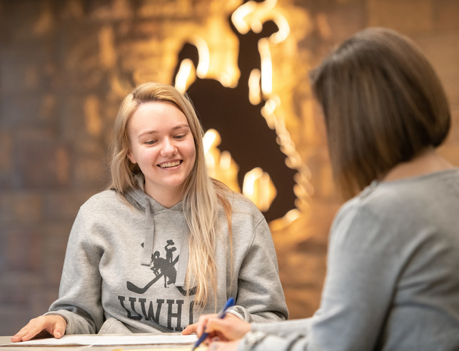 Student and professor working together