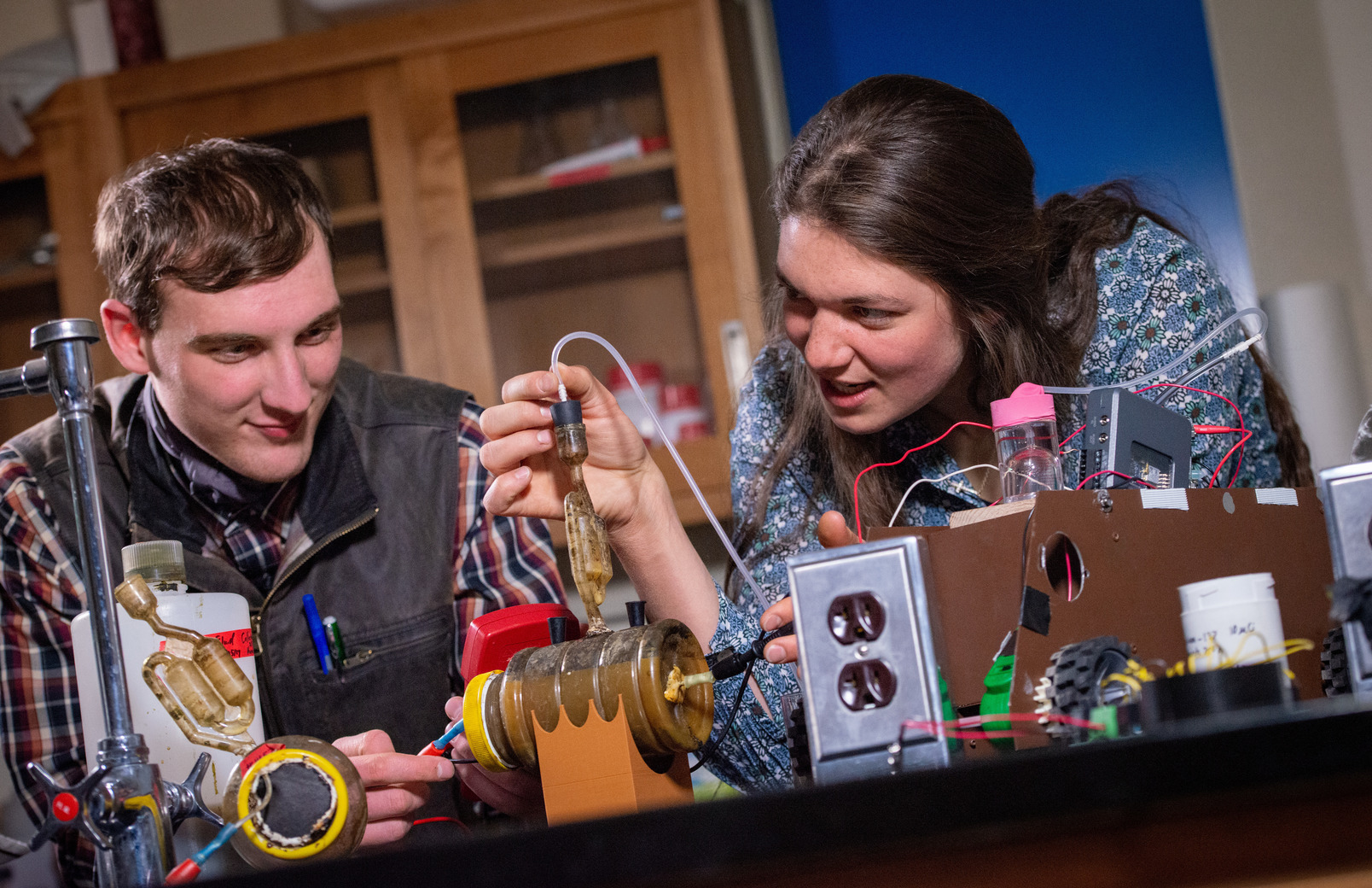 Two students working together in lab