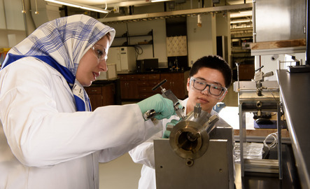 Student and professor in chemical engineering lab