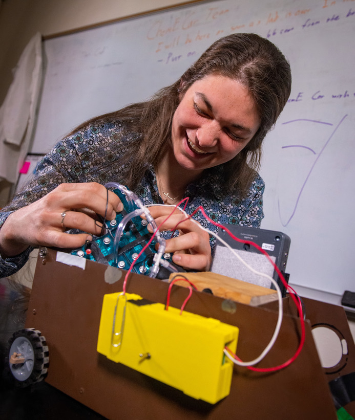 A chemical engineering student in a lab